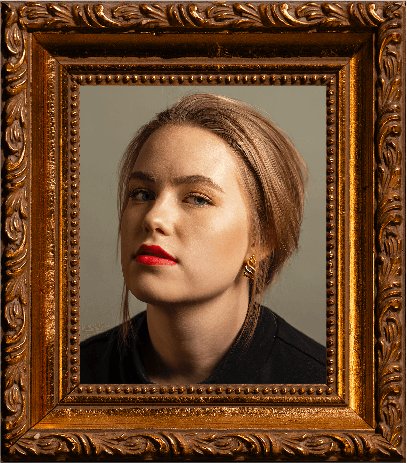 Claire Kurronen headshot in ornate frame